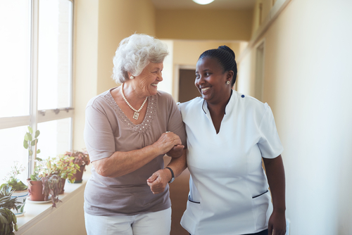 nurse caring for senior woman